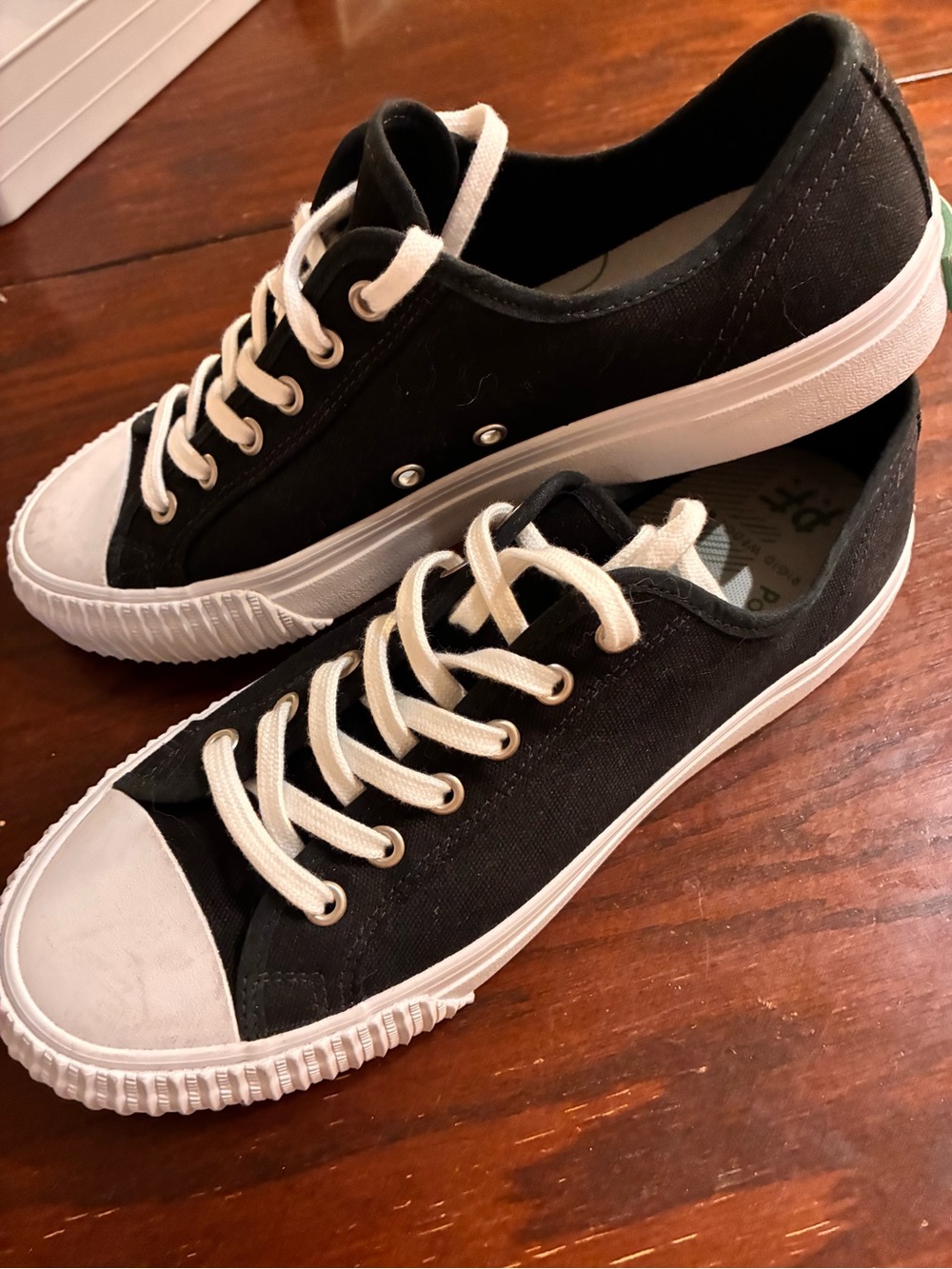 Men's PF Flyers, low cut black canvas, white cap, size 9.5